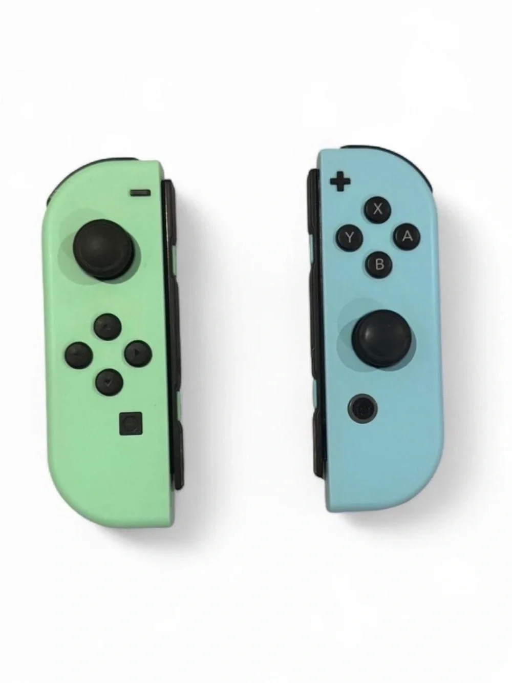 Nintendo Switch with Mint Green Left and Light Blue Right Joy‑Con